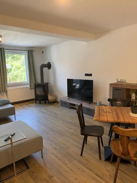 FACHWERK16, Hofquartier Wohnzimmer mit Kaminofen